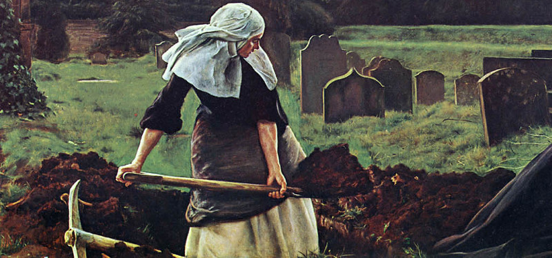 a woman digging a grave