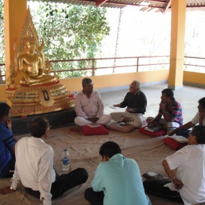 Dh. Surangam leading group in Dhamma Teaching hall above dining hall