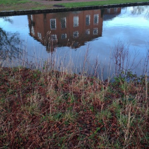 Adhisthana reflected in the lake