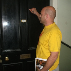 Mike knocks a door for the Edinburgh Karuna Appeal