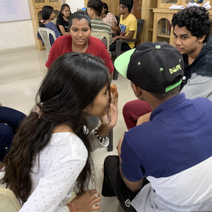 Chinese Whisper students are playing games