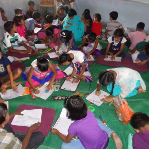 approx.60 children's engaged in creative painting session.