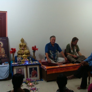 Dharmbandhu and Suman conducting Dhamma class for women's community.